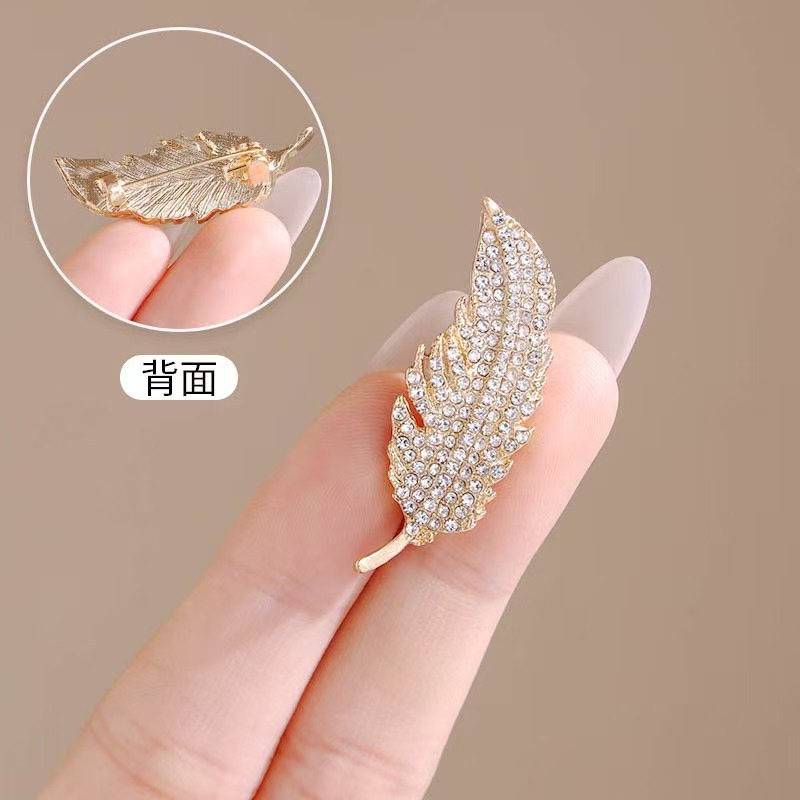 เข็มกลัดขนนกประดับเพชรเต็มตัวส - Travel Accessories Luxury บทวิจารณ์และราคา
